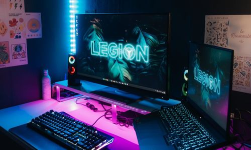 Minimalist desk setup with soft neon lighting accents